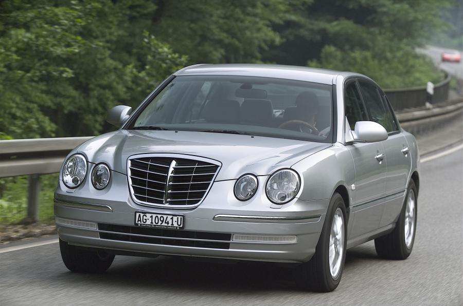  Kia Opirus 2003 года  (фото 4 из 54)